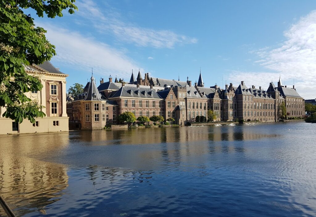 Historic Binnenhof home to the seat of the Dutch Government stands in front of the iconic Hofvijver lake in The Hague's city centre