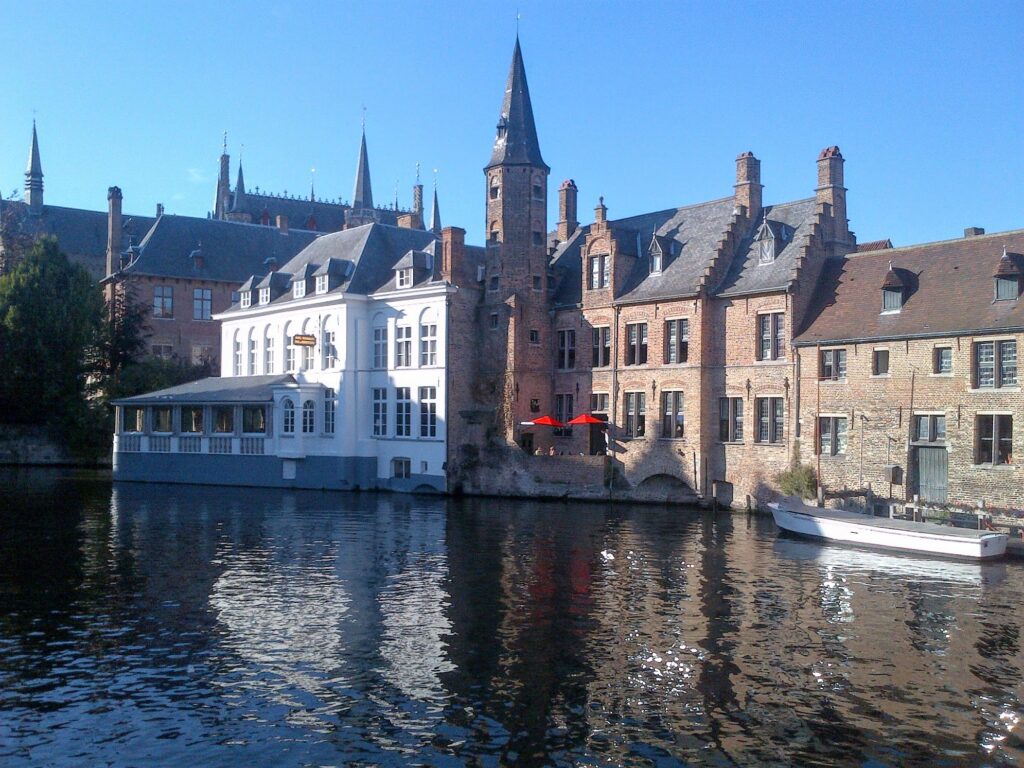 Bruges' picture-perfect historic medieval buildings stand along its picturesque canals 