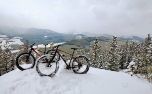 Bike touring Canada on Fat Bikes at the top of Bragg Creek Rocky Mountains Canada