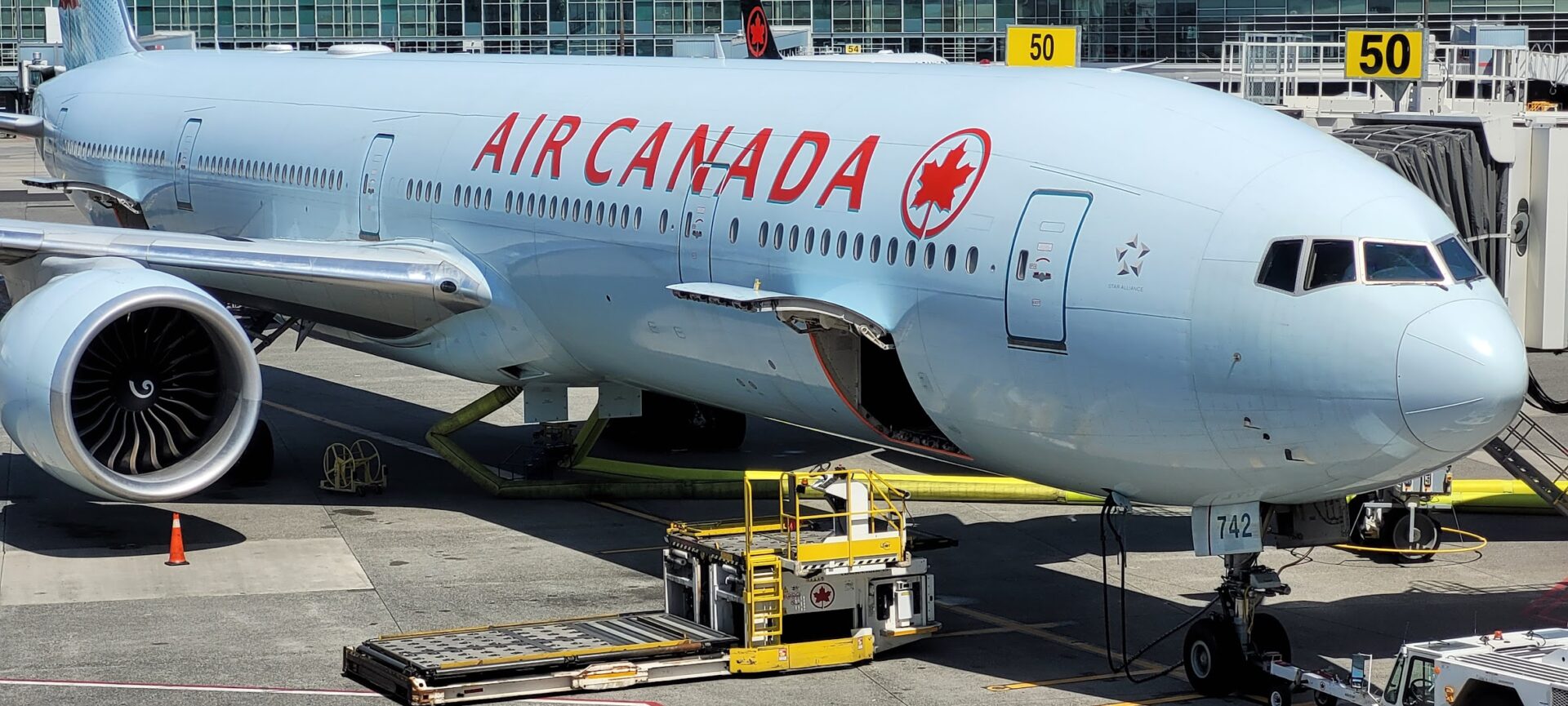 An Air Canada 777 300 ER awaiting passengers