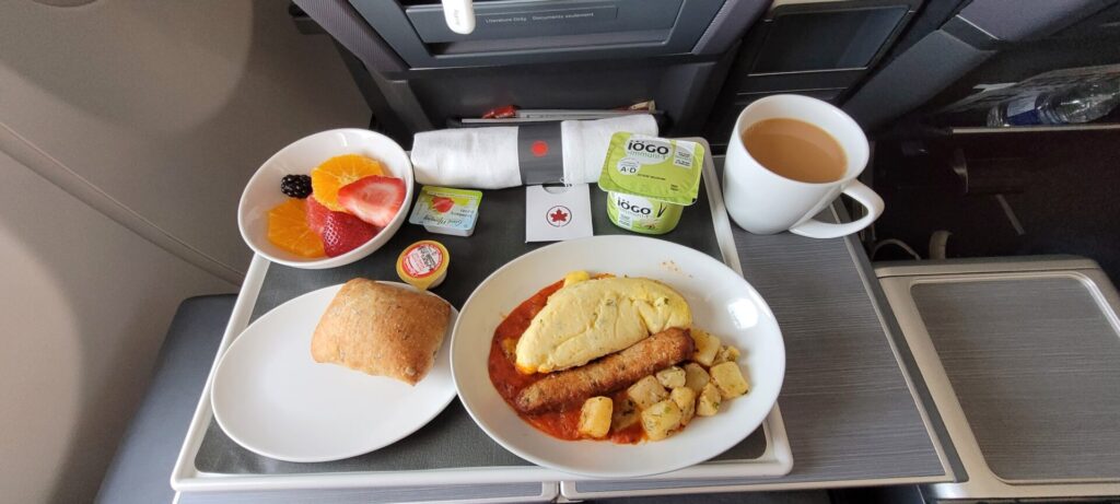 Photo of my breakfast selection of the omelette with fruit in Air Canada Domestic Business on the A321